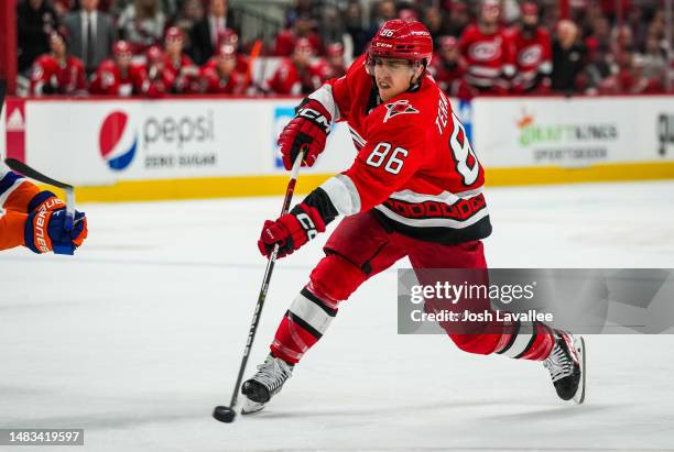 Teuvo Teravainen of the Carolina Hurricanes shoots the puck during the third period against the New York Islanders in Game Two of the First Round of...