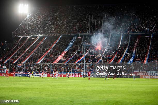 General view as fans light flares in the stands during a Copa CONMEBOL Libertadores 2023 group B match between Nacional and Independiente Medellin at...
