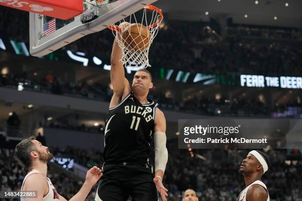 Brook Lopez of the Milwaukee Bucks dunks the ball against the Miami Heat during the first half of Game Two of the Eastern Conference First Round...