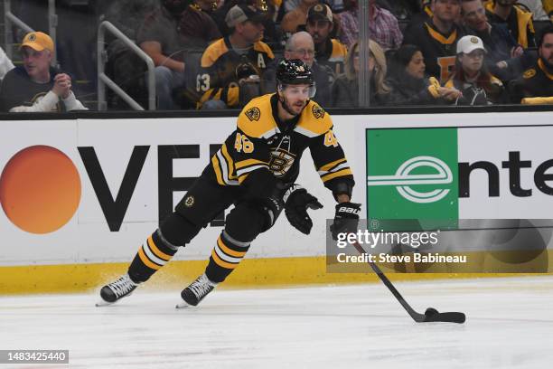 David Krejci of the Boston Bruins skates with the puck against the Florida Panthers in Game Two of the First Round of the 2023 Stanley Cup Playoffs...