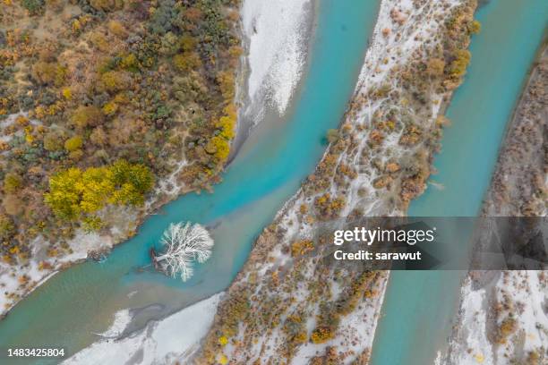 aerial drone view of attabad lake in a beautiful autumn season - himalayas stock pictures, royalty-free photos & images