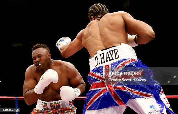 David Haye in action with Dereck Chisora during their vacant WBO and WBA International Heavyweight Championship bout on July 14, 2012 in London,...