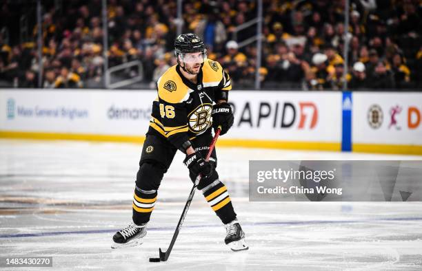 David Krejci of the Boston Bruins skates with the puck during the second period against the Florida Panthers in Game Two of the First Round of the...