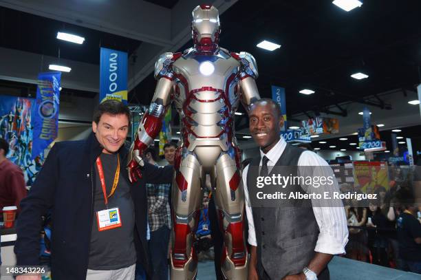 Writer/director Shane Black and actor Don Cheadle pose with Marvel Studios during Comic-Con International 2012 at San Diego Convention Center on July...