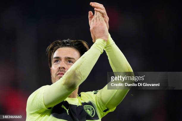 Jack Grealish of Manchester City celebrates with the fans at the end the UEFA Champions League quarterfinal second leg match between FC Bayern...