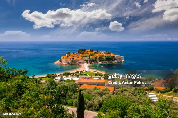 sveti stefan island in budva in a beautiful summer day, montenegro. - budva stock pictures, royalty-free photos & images