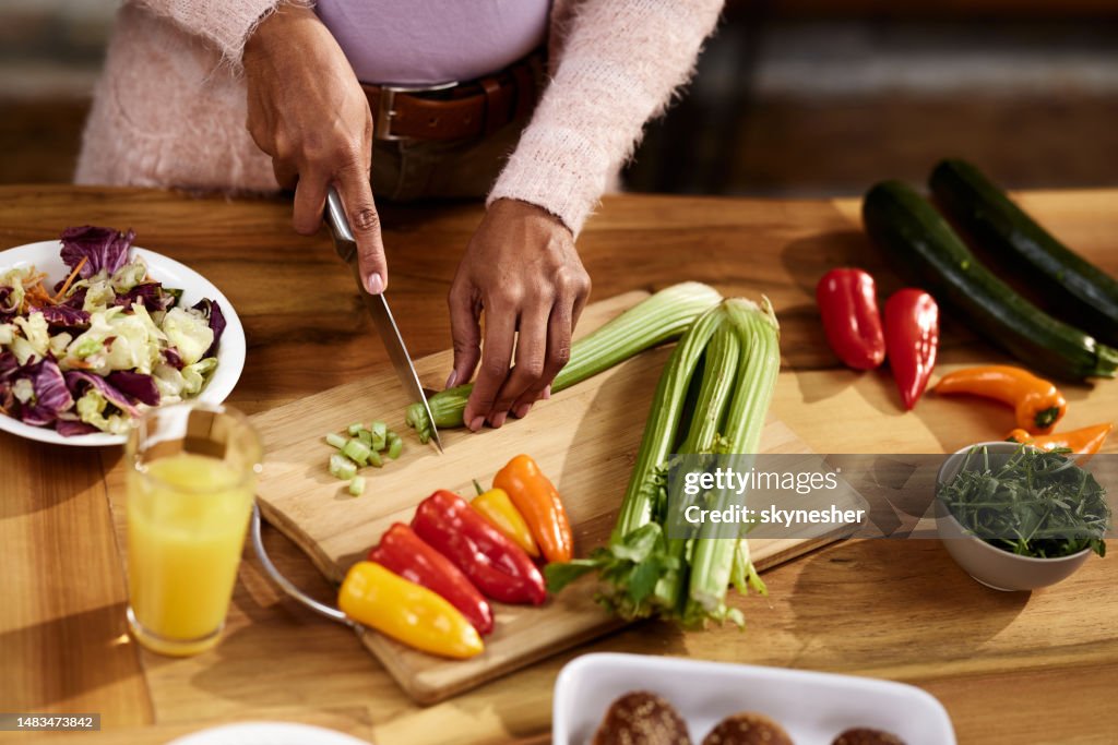 Close up of cutting celery for lunch.