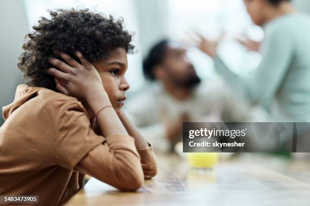 i don't want to listen them arguing! - sulking stock pictures, royalty-free photos & images