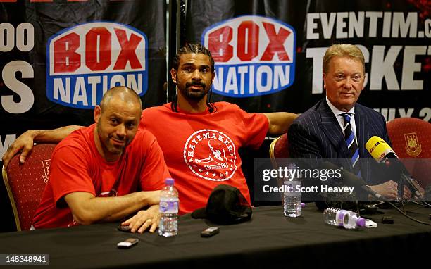 Adam Booth , David Haye and Frank Warren during the post fight press conference after the vacant WBO and WBA International Heavyweight Championship...