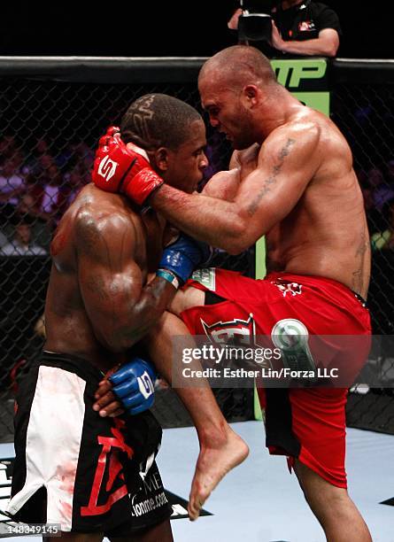 Robbie Lawler knees Lorenz Larkin during their middleweight bout at the Strikeforce event at the Rose Garden on July 14, 2012 in Portland, Oregon.