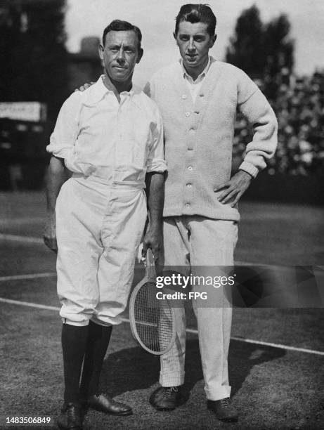 Australian tennis player Horace "Horrie" Rice , holding racket, with American Richard "Dick" Norris Williams , circa 1914.