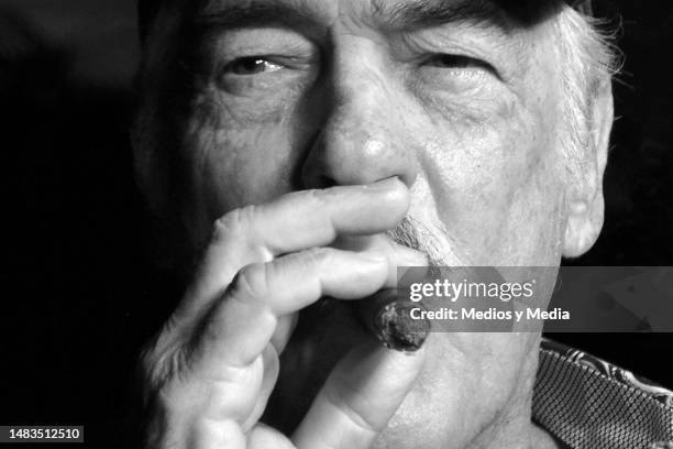 Andrés Garcia smokes a cigar at his home, on May 20, 2018 in Acapulco, Mexico.