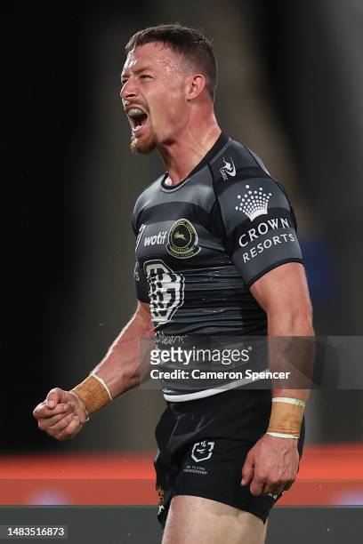 Damien Cook of the Rabbitohs celebrates after scoring a try during the round eight NRL match between South Sydney Rabbitohs and Penrith Panthers at...