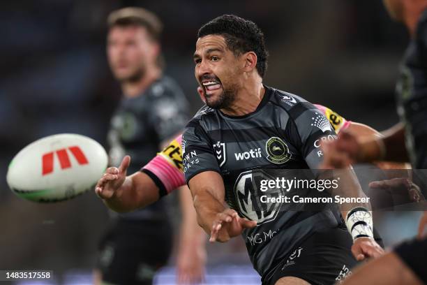 Cody Walker of the Rabbitohs passes the ball during the round eight NRL match between South Sydney Rabbitohs and Penrith Panthers at Accor Stadium on...