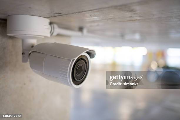 surveillance camera - security cameras stock pictures, royalty-free photos & images