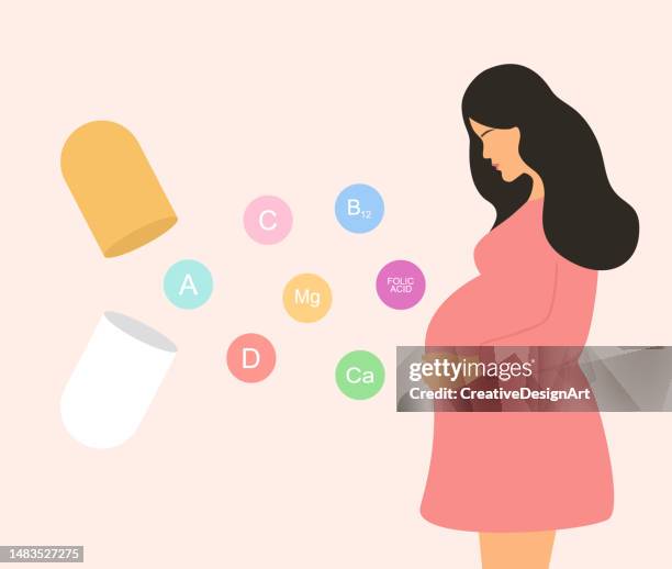 bildbanksillustrationer, clip art samt tecknat material och ikoner med maternity health care concept. side view of young pregnant woman and open capsule with vitamins and minerals - human fertility