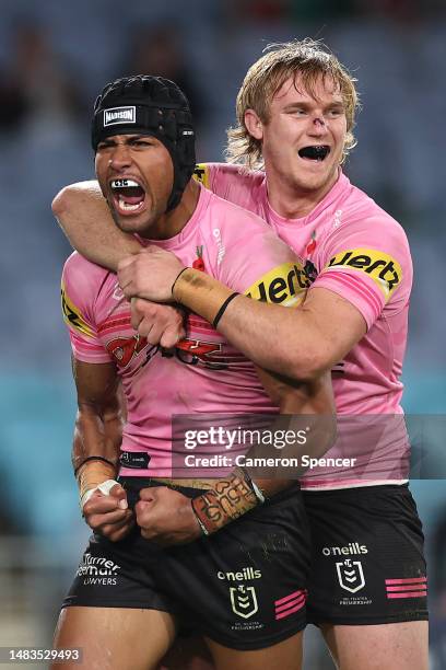 Stephen Crichton of the Panthers celebrates with team mates after scoring a try during the round eight NRL match between South Sydney Rabbitohs and...