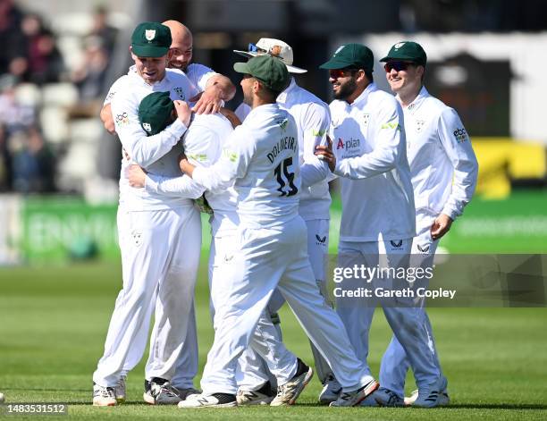 Jake Libby of Worcestershire is congratulated by teammates after catching out Miles Hammond of Gloucestershire during the LV= Insurance County...