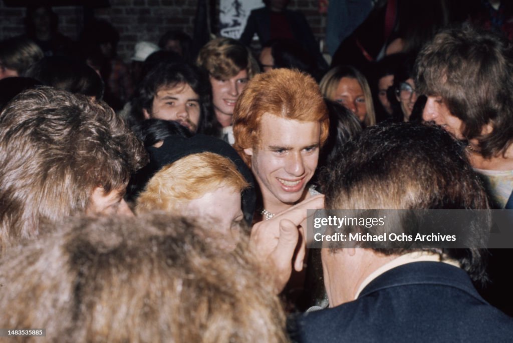 Rodney England American DJ Chuck E Starr among people at Rodney Bingenheimer's... News ...