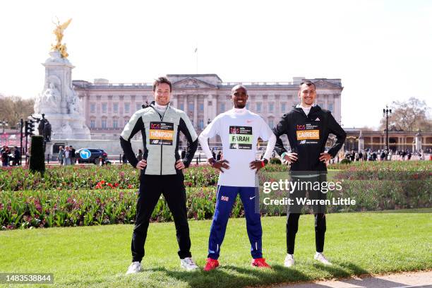 Chris Thompson, Sir Mo Farah and Emile Cairess pose for a photograph outside Buckingham Palace ahead of the 2023 TCS London Marathon on April 20,...