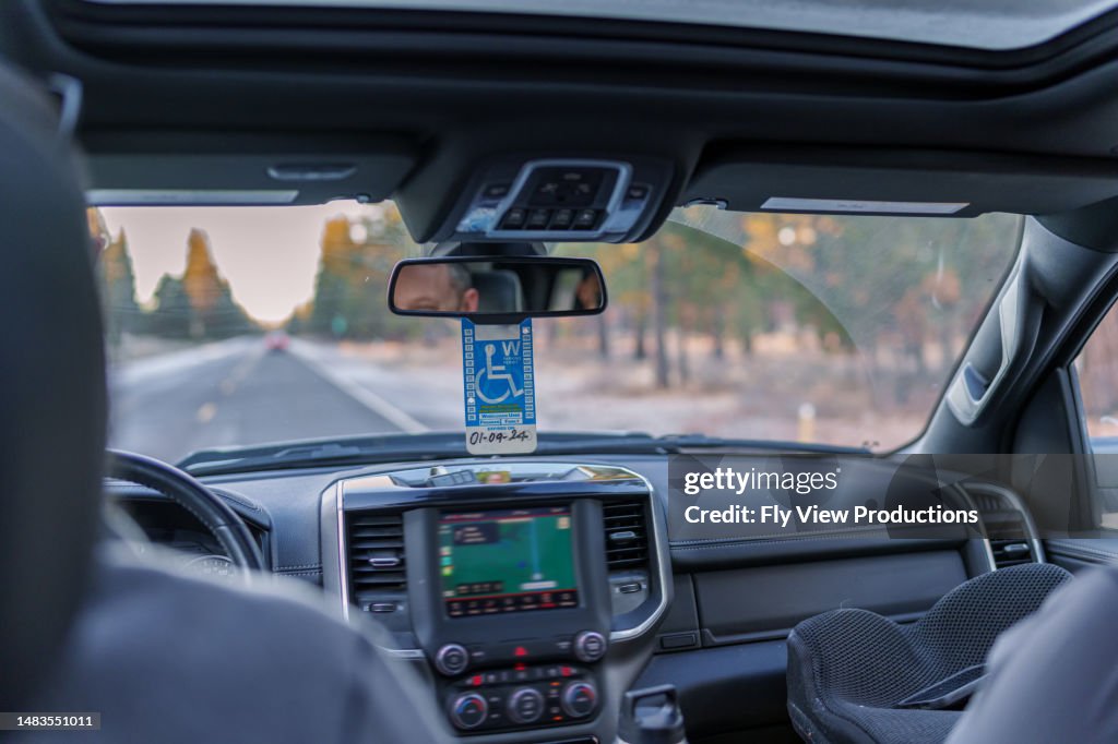 Interior of vehicle with disabled person parking permit