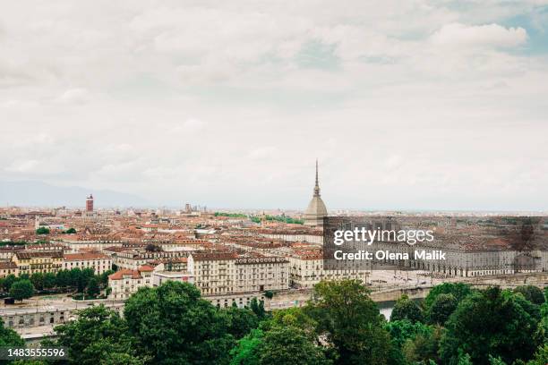 elevated view of turin with the dome of the "mole antonelliana". cityscape of turin, italy - turin fotografías e imágenes de stock