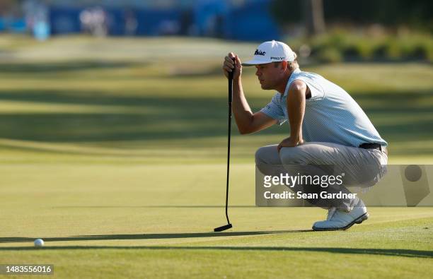 Patton Kizzire of the United States lines up a putt on the first green during the first round of the Zurich Classic of New Orleans at TPC Louisiana...