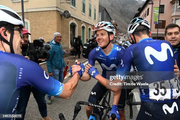 Stage winner Gregor Muhlberger of Austria and Movistar Team celebrates at finish line with teammates Antonio Pedrero of Spain and Óscar Rodríguez of...