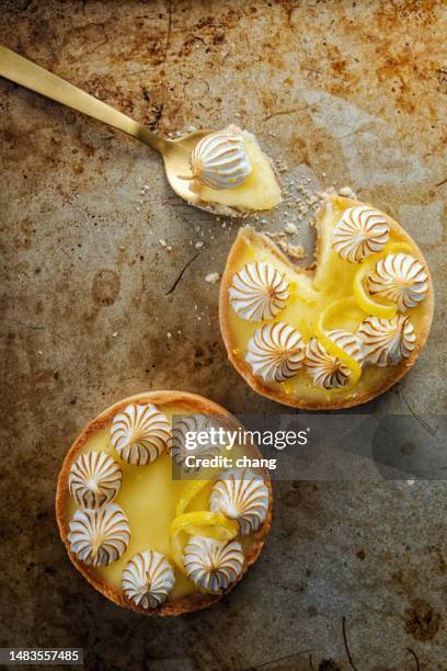 french lemon tart with meringue - tart dessert stock pictures, royalty-free photos & images
