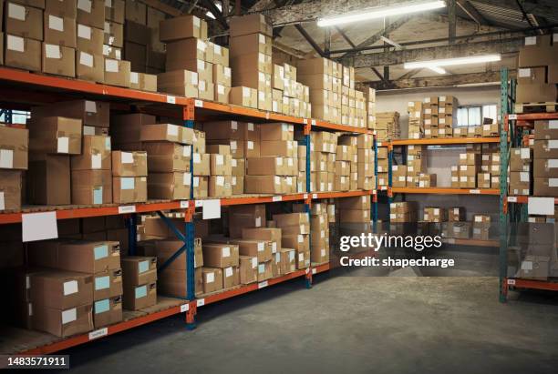 factory, empty shipping warehouse and boxes for distribution, courier and logistics in storage room. backgrounds, stock and commercial package on shelf for cargo, production or wholesale supply chain - stack of boxes in warehouse stock pictures, royalty-free photos & images