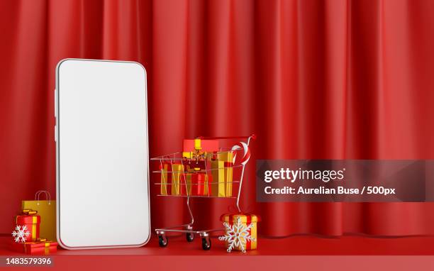 christmas poster of christmas shopping online on smartphone concept,3d illustration,romania - red telephone box stock-fotos und bilder