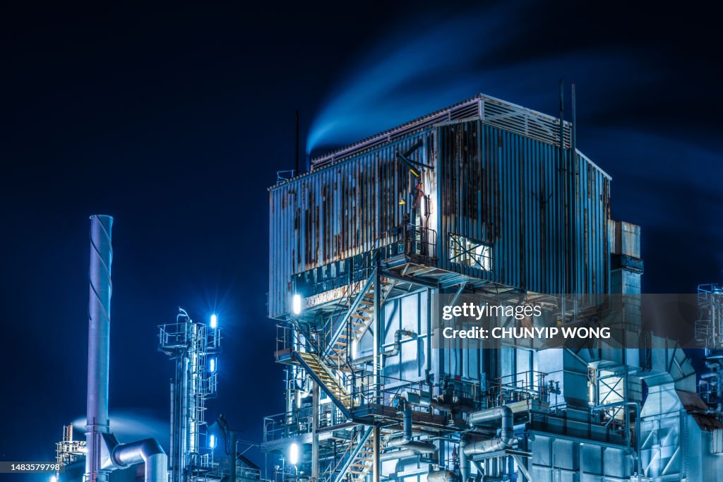 Petrochemical oil and gas refinery plant in night