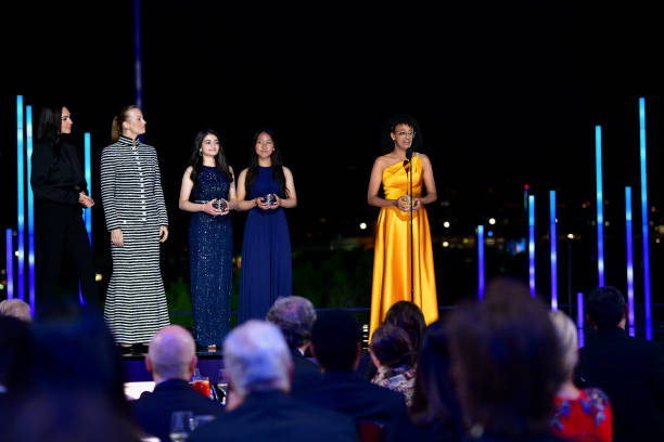 Gal Gadot, Julia Milner, Noor Haideri, Amber Kwok and Maryam Tsegaye stand onstage at the Ninth Breakthrough Prize Ceremony at Academy Museum of...
