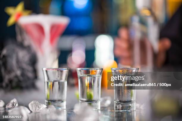 close-up of drinks on table - vodka bildbanksfoton och bilder