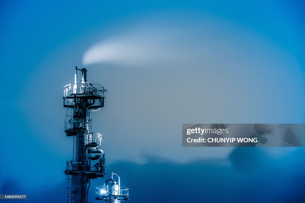 Petrochemical oil and gas refinery plant in night