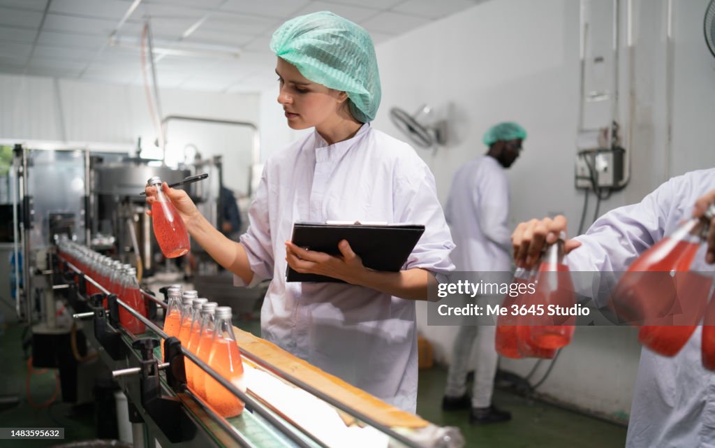 Food Production Control Methods Women Control The Production Of The Food Industry High-Res Stock Photo ...