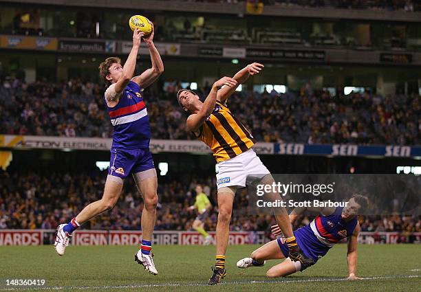 Tom Williams of the Bulldogs takes a mark during the round 16 AFL match between the Western Bulldogs and Hawthorn Hawks at Etihad Stadium on July 15,...