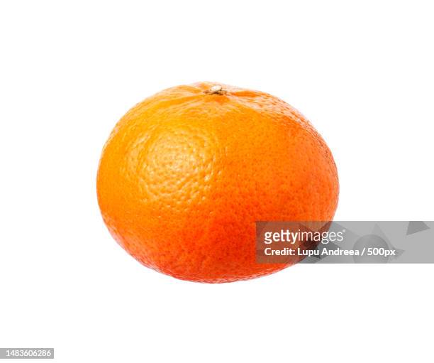 close-up of orange against white background,romania - mandarine stock-fotos und bilder