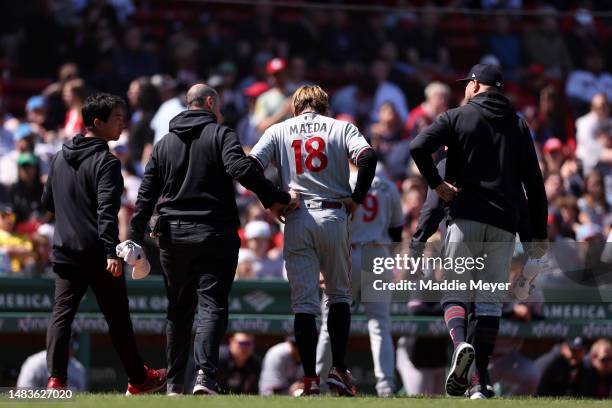 Kenta Maeda of the Minnesota Twins exits the game after being struck by a line drive during the second inning against the Boston Red Sox at Fenway...