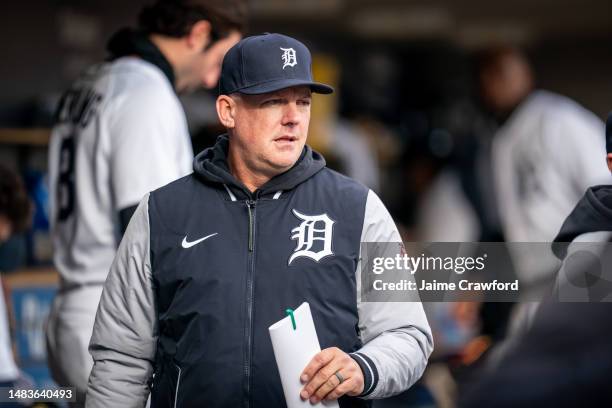 Manager A.J. Hinch of the Detroit Tigers walks through the dugout in the eighth inning against the Cleveland Guardians in game two of a doubleheader...