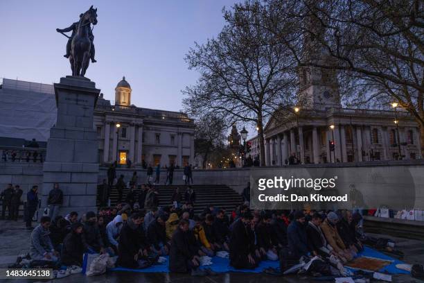 Muslims gather in Trafalgar Square for an open iftar event on April 20, 2023 in London, England.