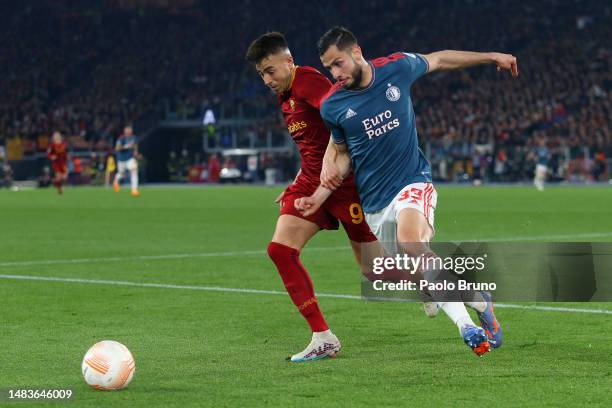 Stephan El Shaarawy of AS Roma runs with the ball whilst under pressure from David Hancko of Feyenoord during the UEFA Europa League Quarterfinal...