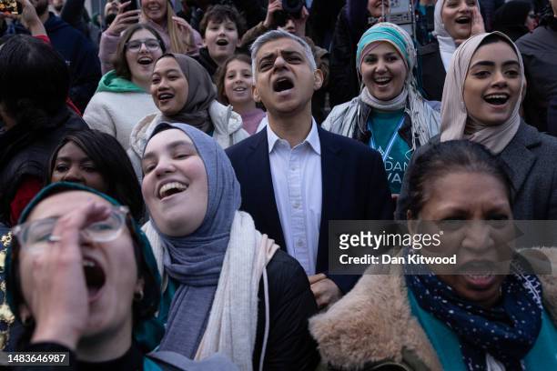 Muslims including London mayor Sadiq Khan and members of other faiths gather in Trafalgar Square for an open iftar event on April 20, 2023 in London,...