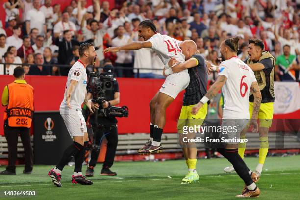 Loic Bade of Sevilla FC celebrates after scoring the team's second goal with teammates during the UEFA Europa League Quarterfinal Second Leg match...
