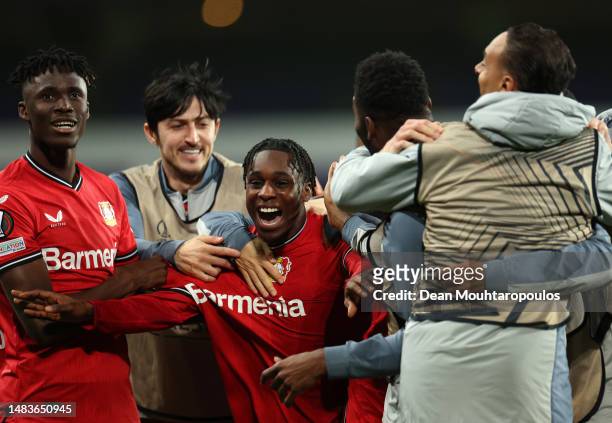 Jeremie Frimpong of Bayer 04 Leverkusen celebrates with teammates after scoring the team's third goal during the UEFA Europa League Quarterfinal...