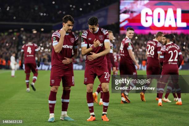 Lucas Paqueta of West Ham United celebrates with teammate Nayef Aguerd after scoring the team's second goal during the UEFA Europa Conference League...