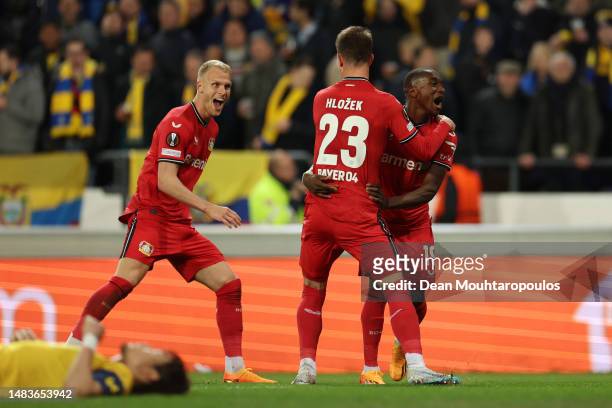 Adam Hlozek of Bayer 04 Leverkusen celebrates with teammate Moussa Diaby after scoring the team's fourth goal during the UEFA Europa League...