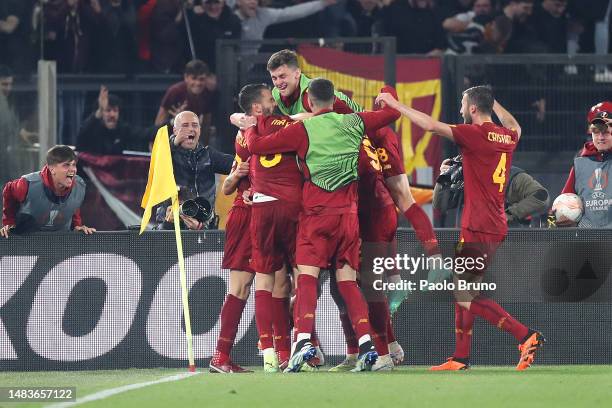 Paulo Dybala of AS Roma celebrates after scoring the team's second goal with teammates during the UEFA Europa League Quarterfinal Second Leg match...