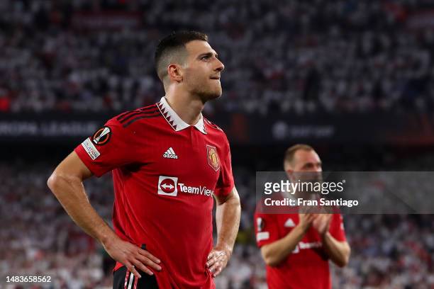 Diogo Dalot of Manchester United looks dejected after their side's defeat in the UEFA Europa League Quarterfinal Second Leg match between Sevilla FC...