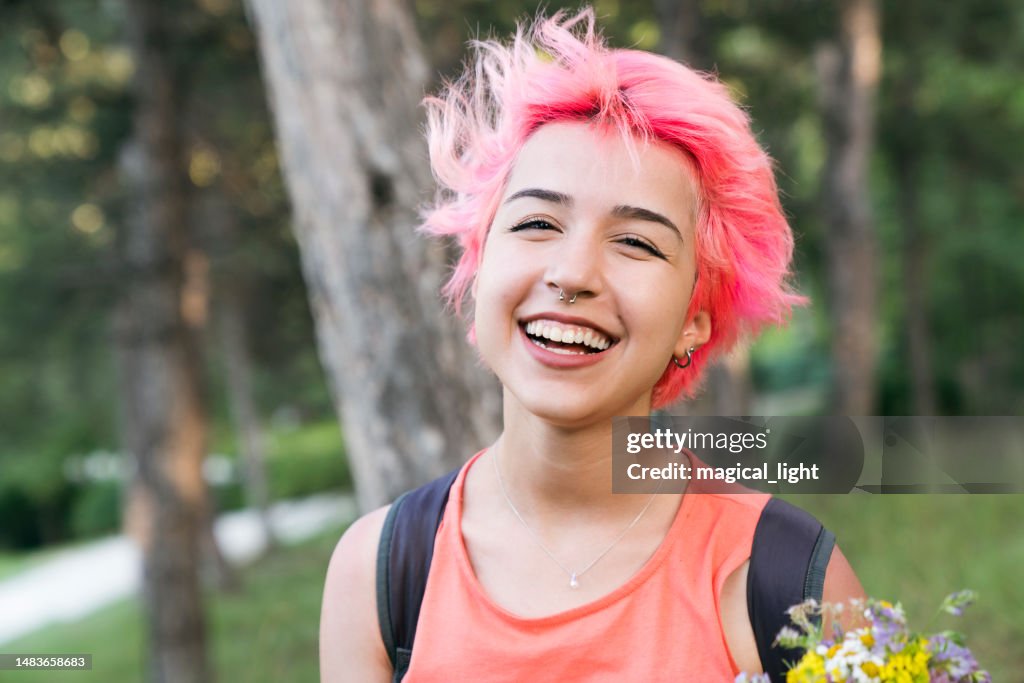 Portrait of a non-binary person with dye hair